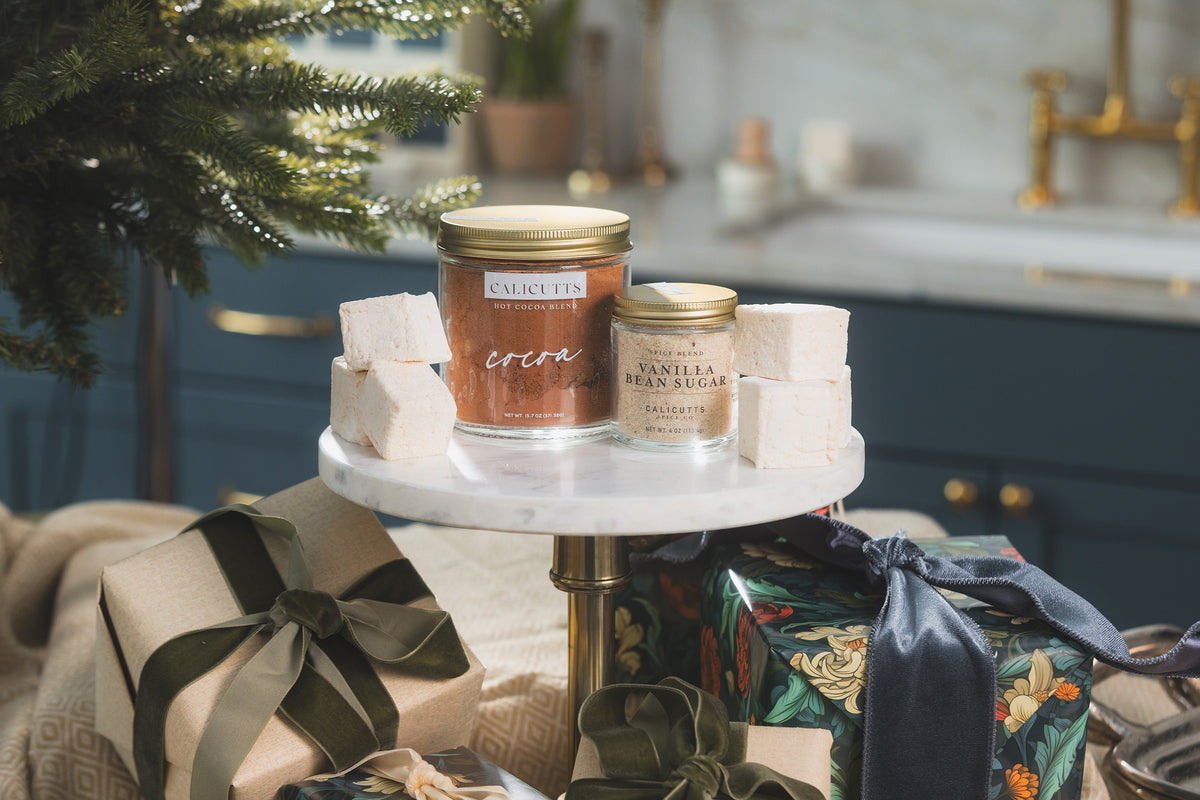 a table with presents and a jar of spices