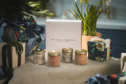 a group of jars of spices and a gift box