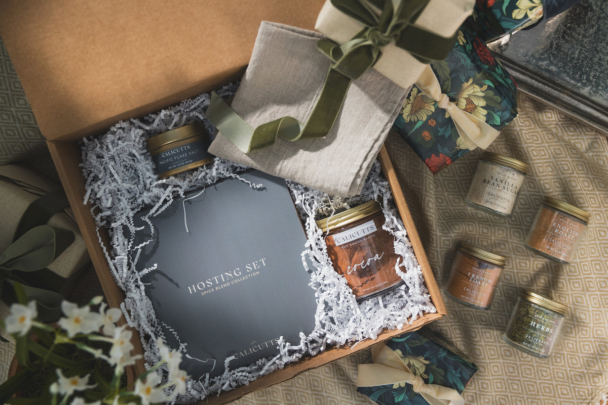 a box with a gift box and a box of jars